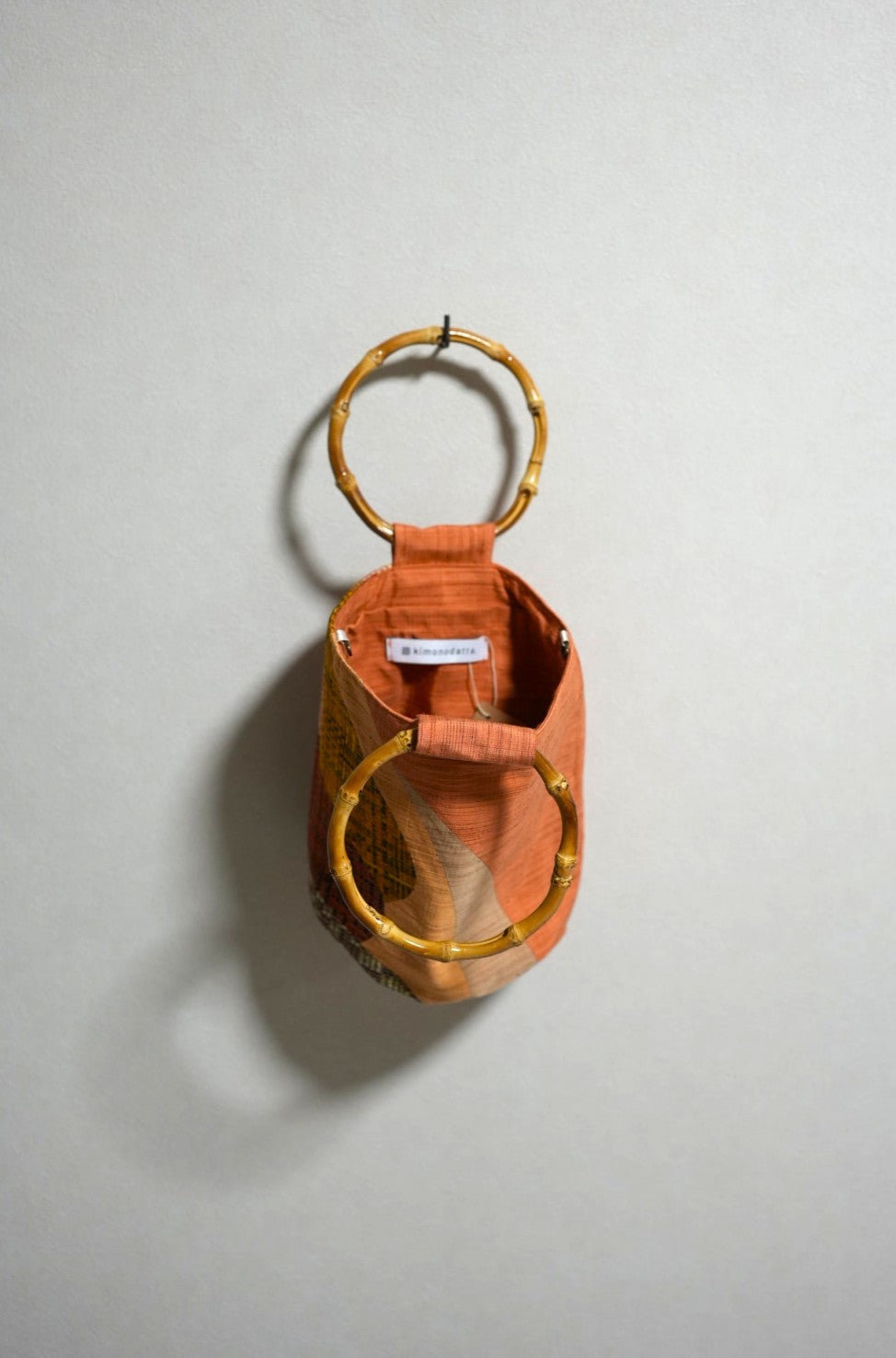 [Persimmon color/multicolor lattice] obi bamboo-handle bag